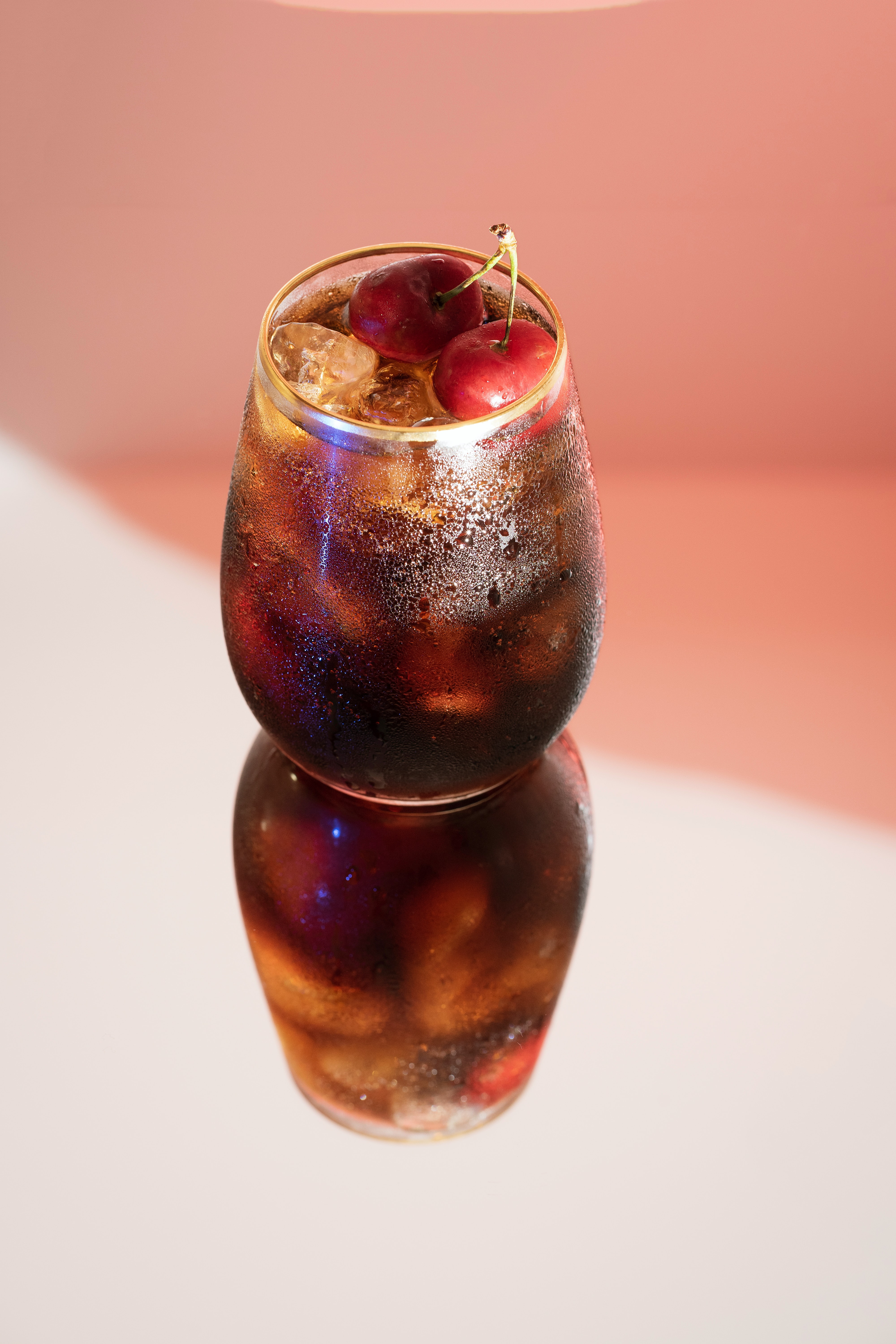 Cherry Rum Coke Cocktail in glass